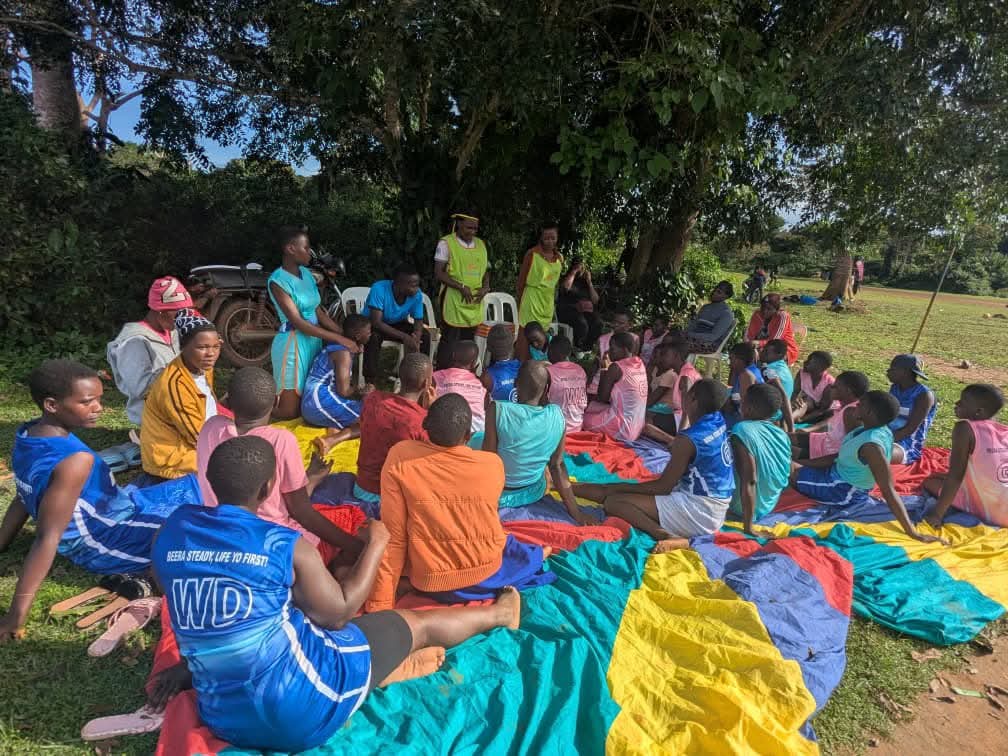 Young people participating in a community health or SRHR awareness session at Bussi island in Uganda.