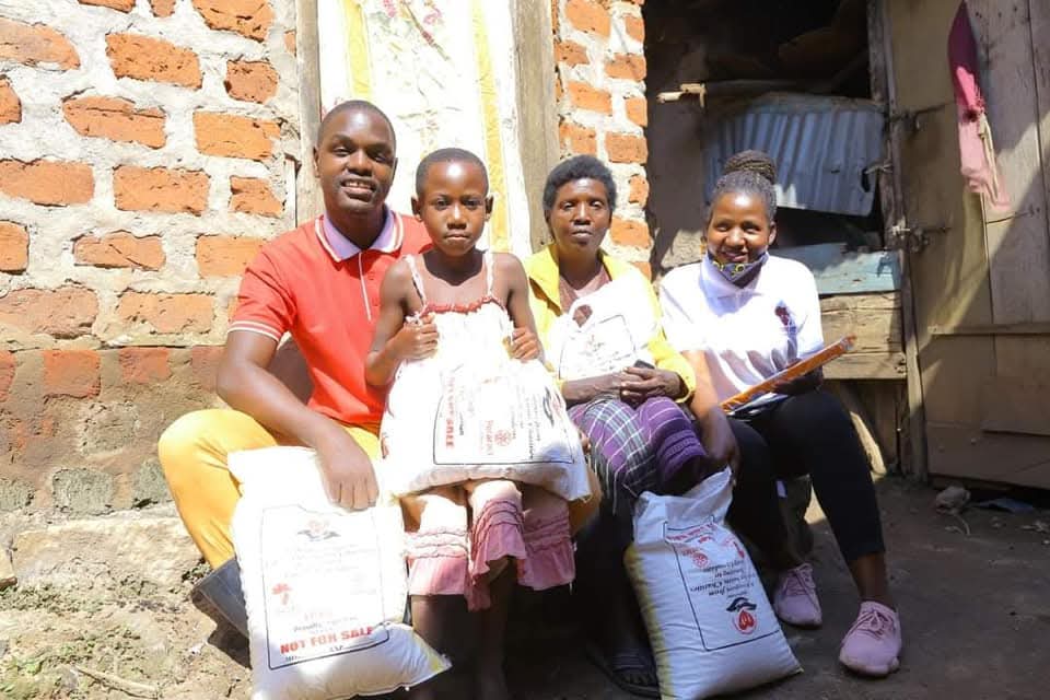 ZAF team giving out food to the needy community members